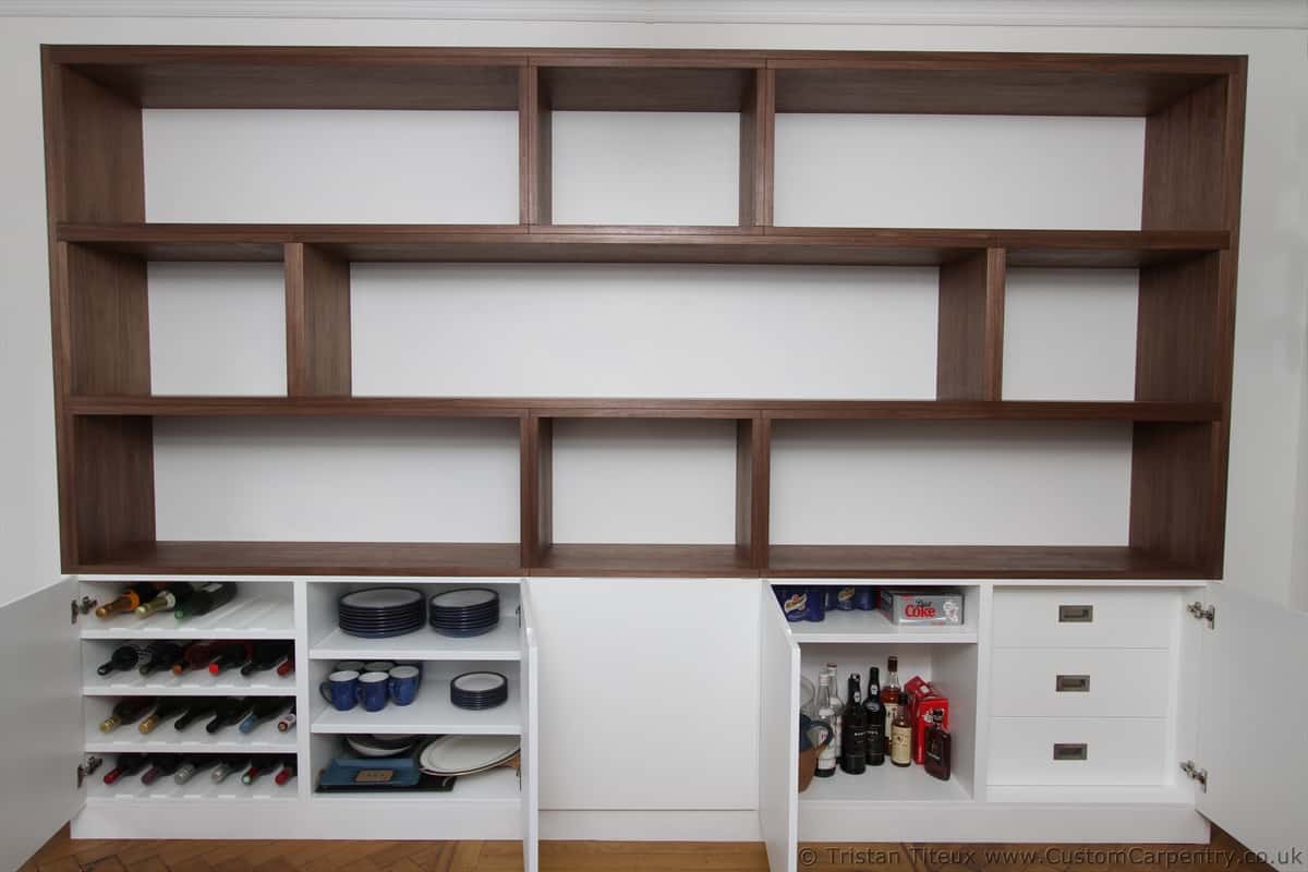 Bespoke shelves made from walnut veneer on a white background with doors below
