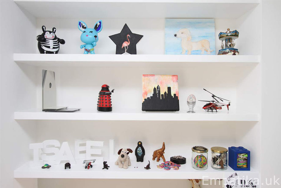 White-fitted-floating-shelves