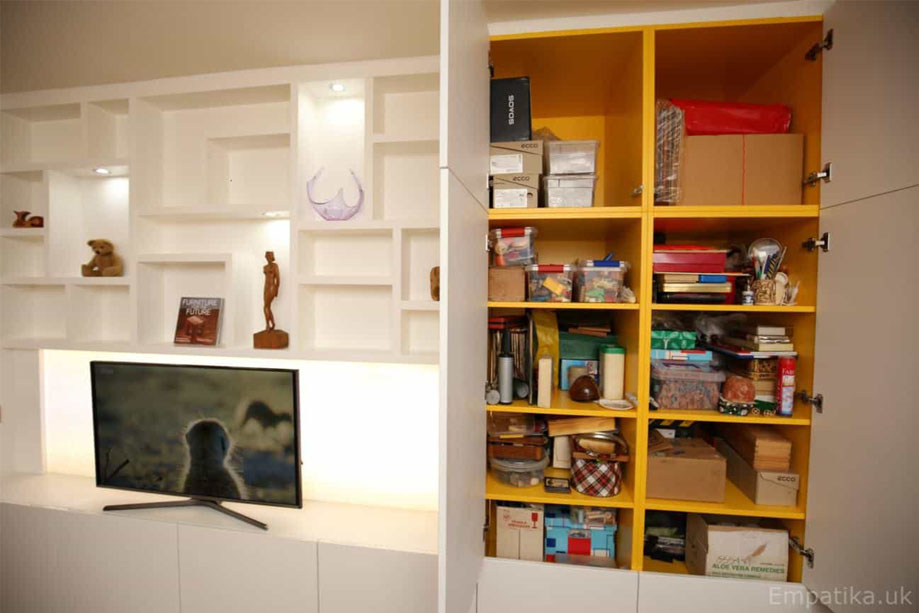 Bespoke White painted display unit with closets and more storage shelves inside
