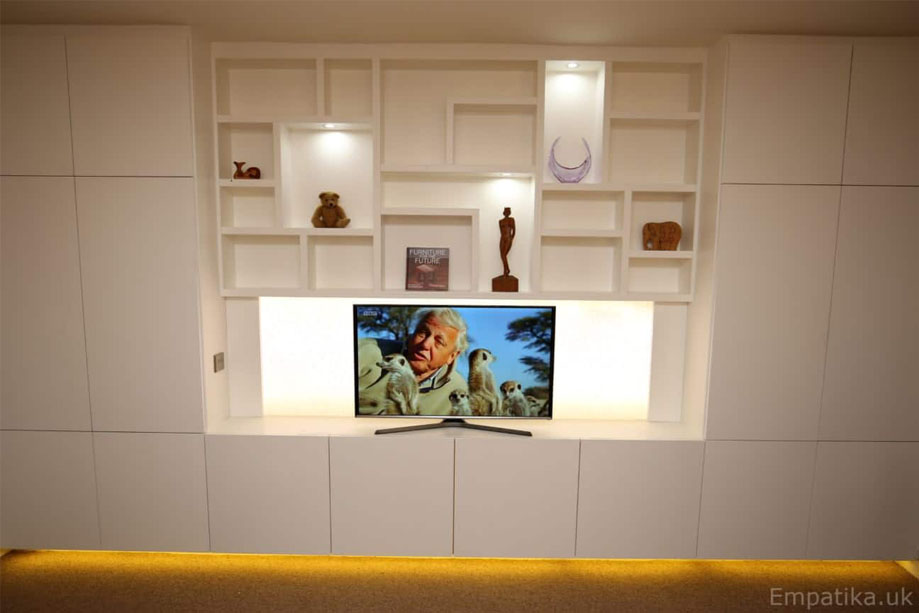 Bespoke eco-fitted TV media unit free of formaldehyde with Yellow furniture underglow