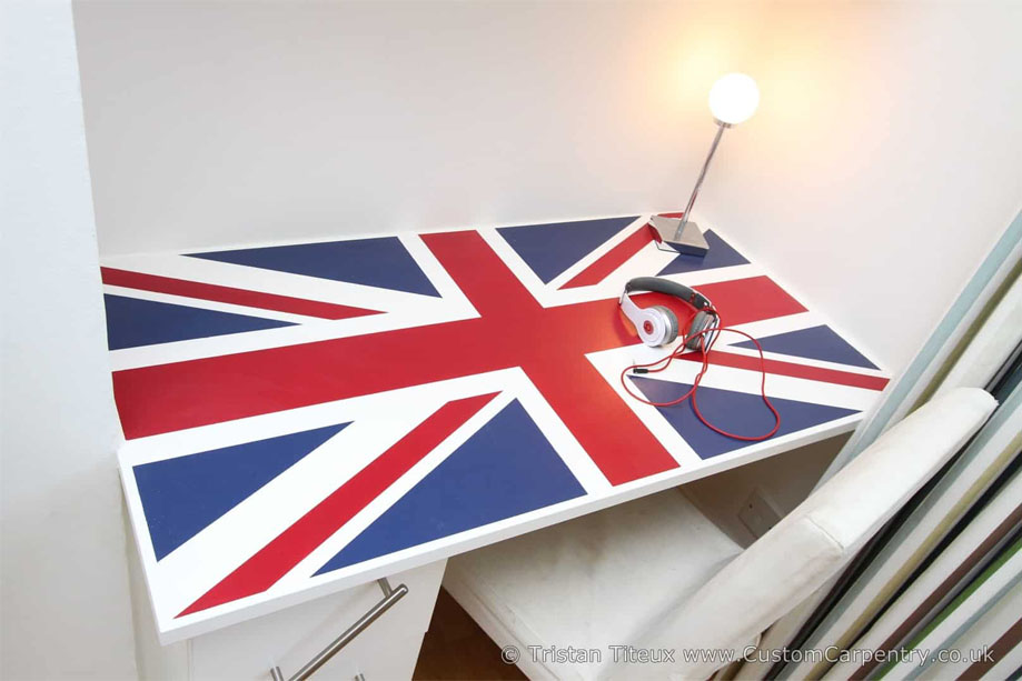 Spacious Union Jack desk with drawers on the side fitted on a corner wall in a children's bedroom