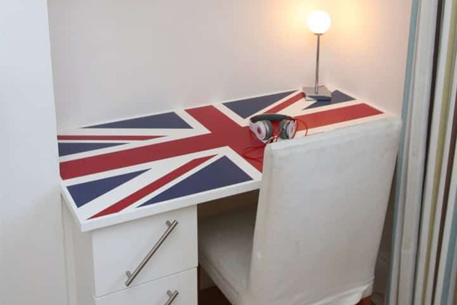 Full view of Children's bedroom Union Jack desk with 3 vertical drawers and built in shelving