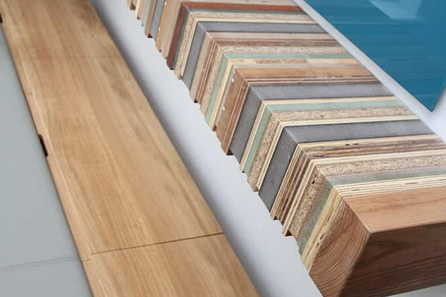Closer look at built in eco-friendly shelf made from recylced wood on the center of a home office