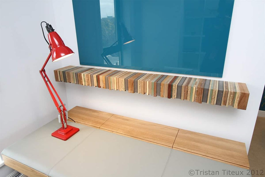 Full view of artistic built in home office shelf made from eco-friendly recylced wood
