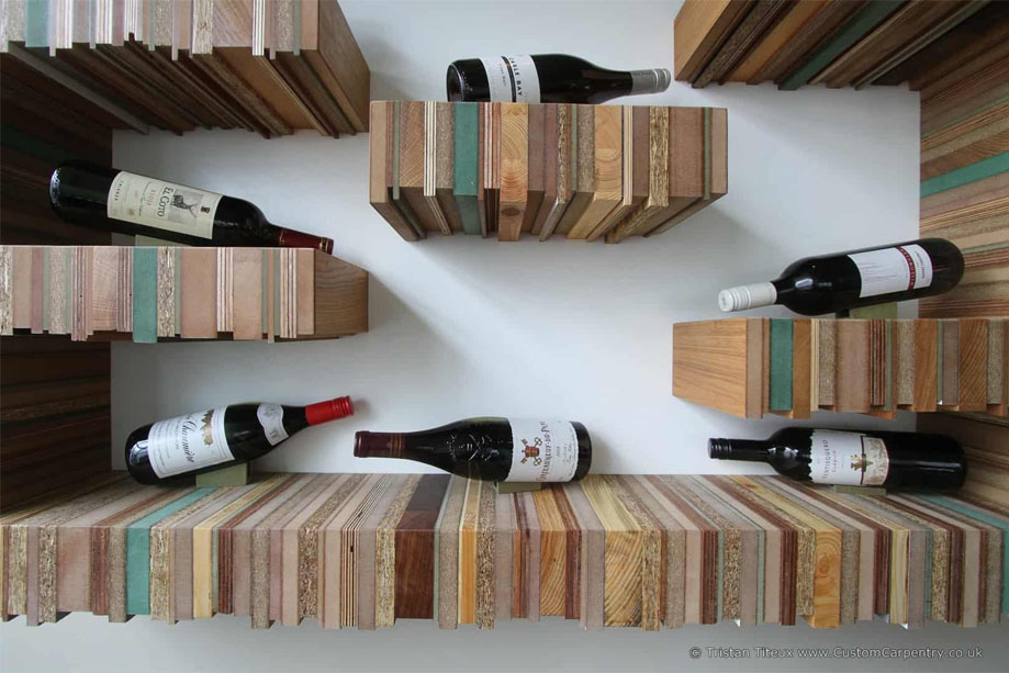 Front view of bespoke wall-mounted Milo wood wine display unit designed by ReCut by Tristan Titeux