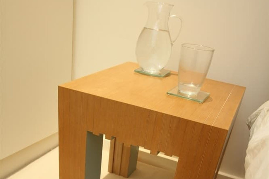 Custom eco-fitted bedside table made from recyled Mio wood