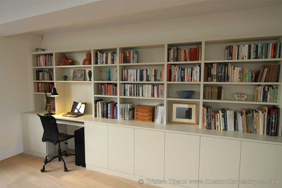 Home office fitted library bookcase with computer desk and bottom closets all painted Whie