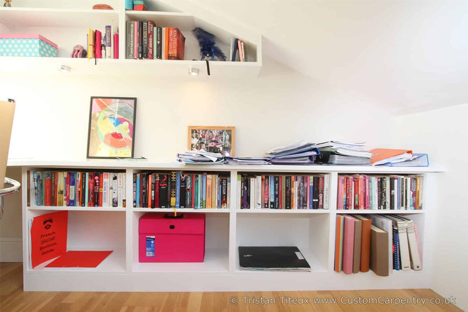 White painted built in fitted shelves in a home office